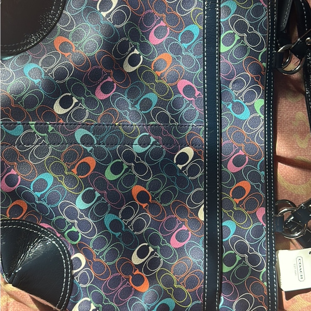 Brand new with tags Coach multi color purse